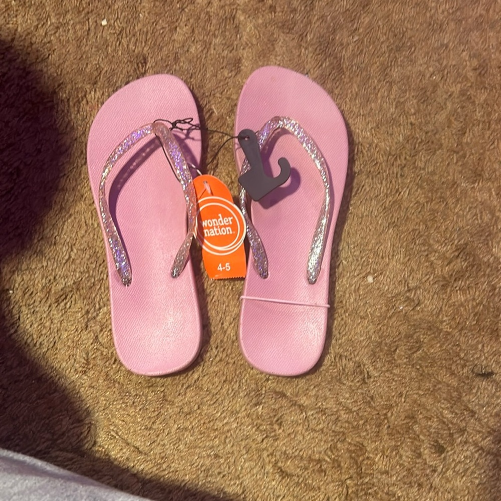 Pink flip flops with sparkles